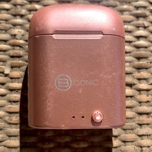 Iconic earbuds in chargeable case never used